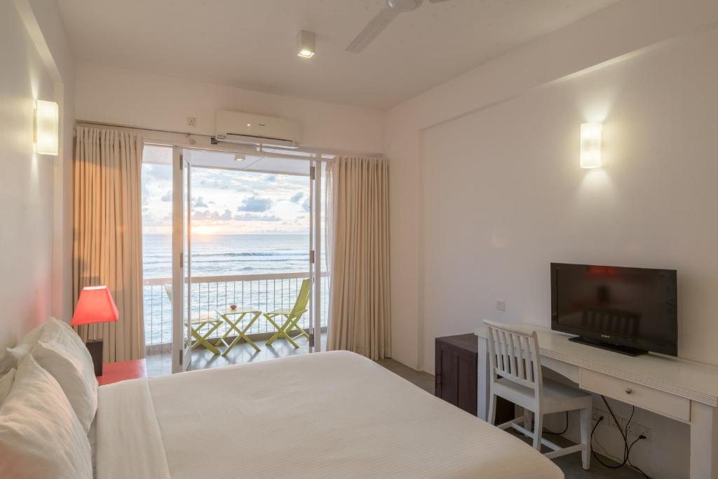 Deluxe Triple Room with sea view